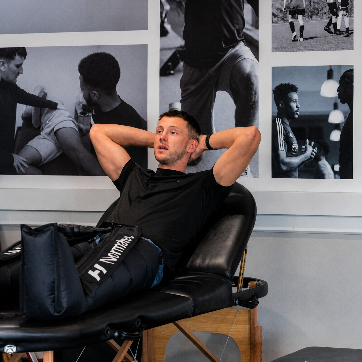 Athlete using compression recovery boots inside Back2Action